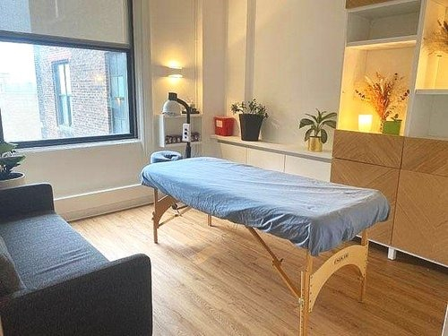 Cozy office corner with plant and couch