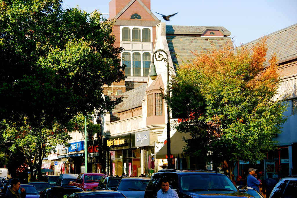 Foyer with wooden flooring and modern chair