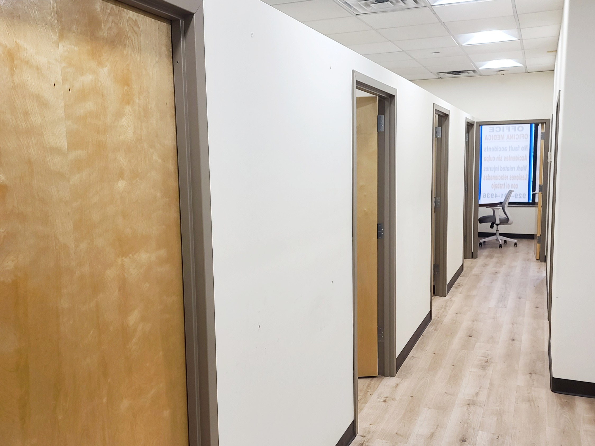 Interior hallway with chairs and furniture arranged