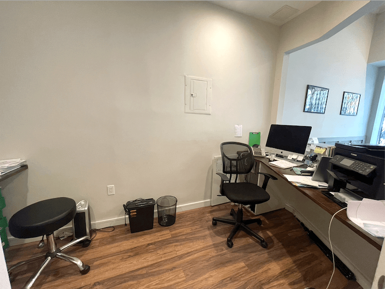 Office desk with computer monitor and keyboard setup
