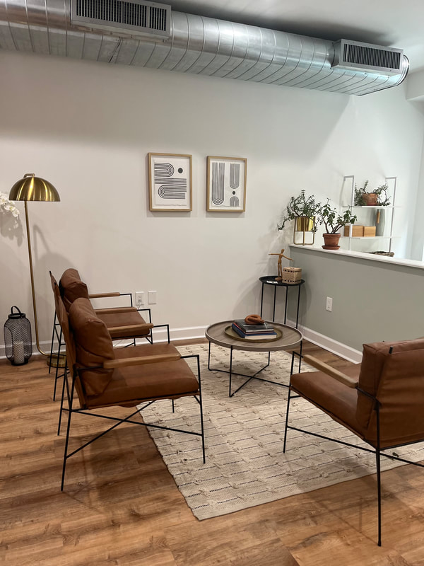 Inviting lobby area with chairs and home decor accents