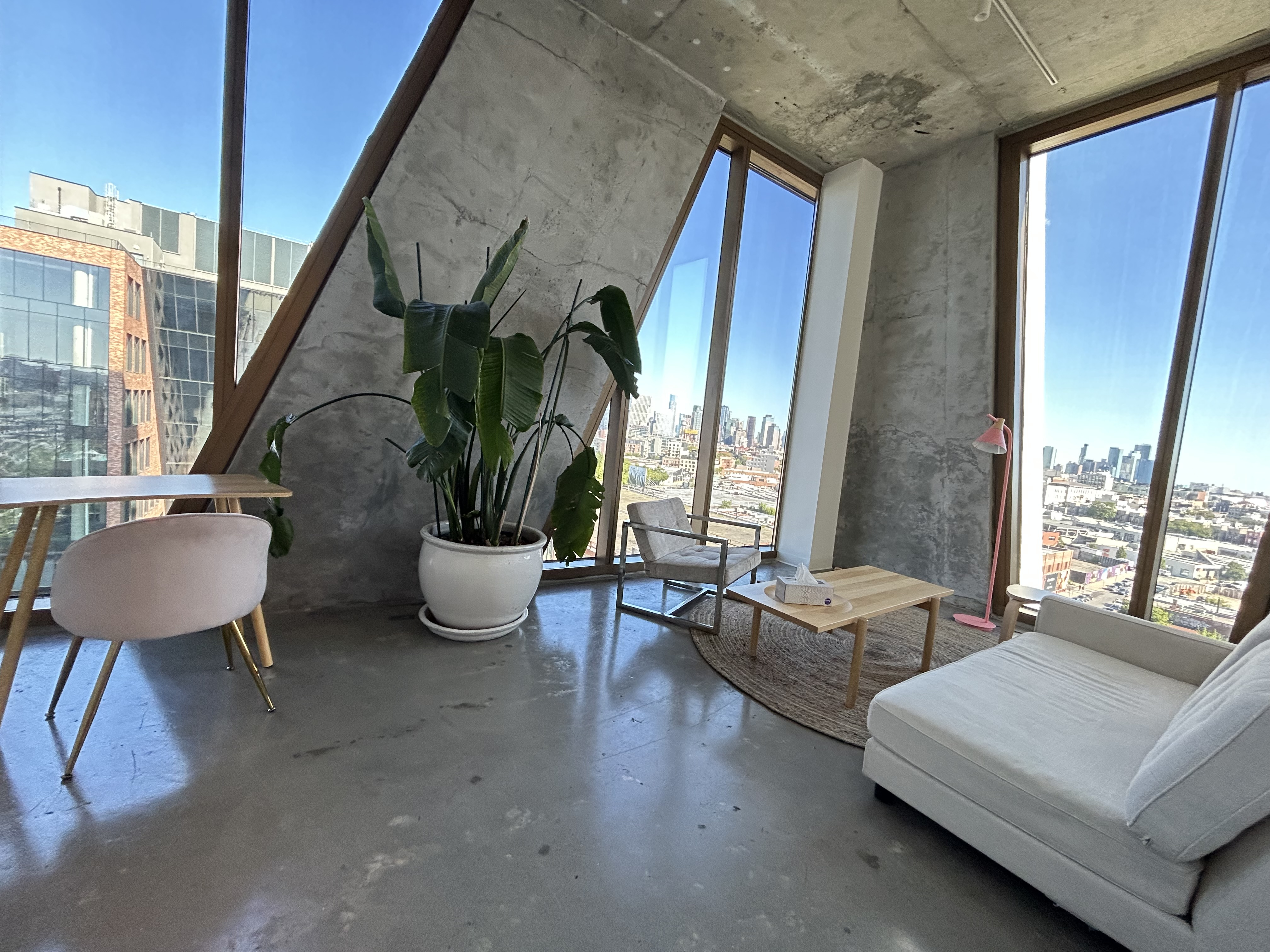 Penthouse office with loft design featuring seating area