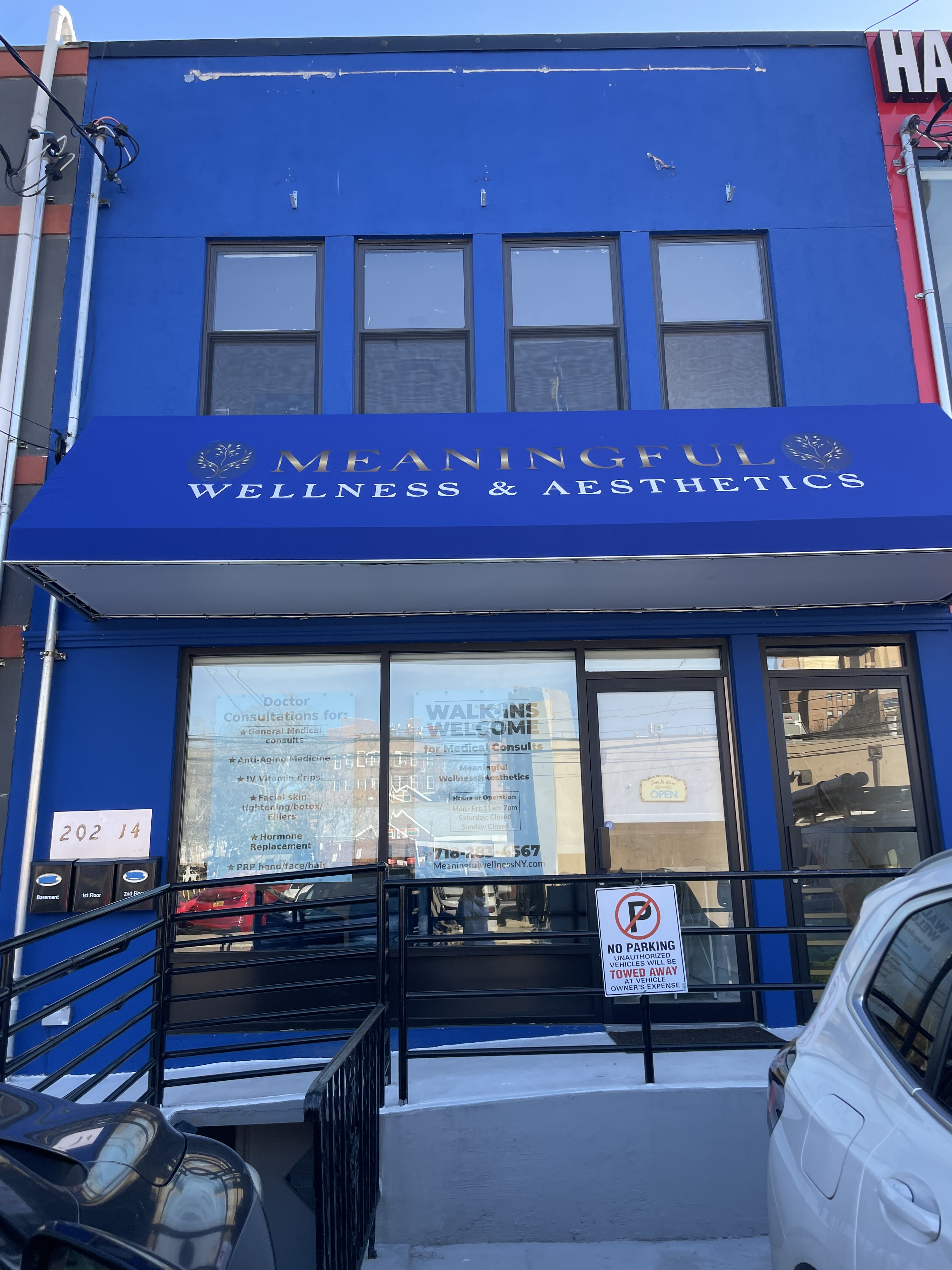Loading area and sidewalk with parked vehicles