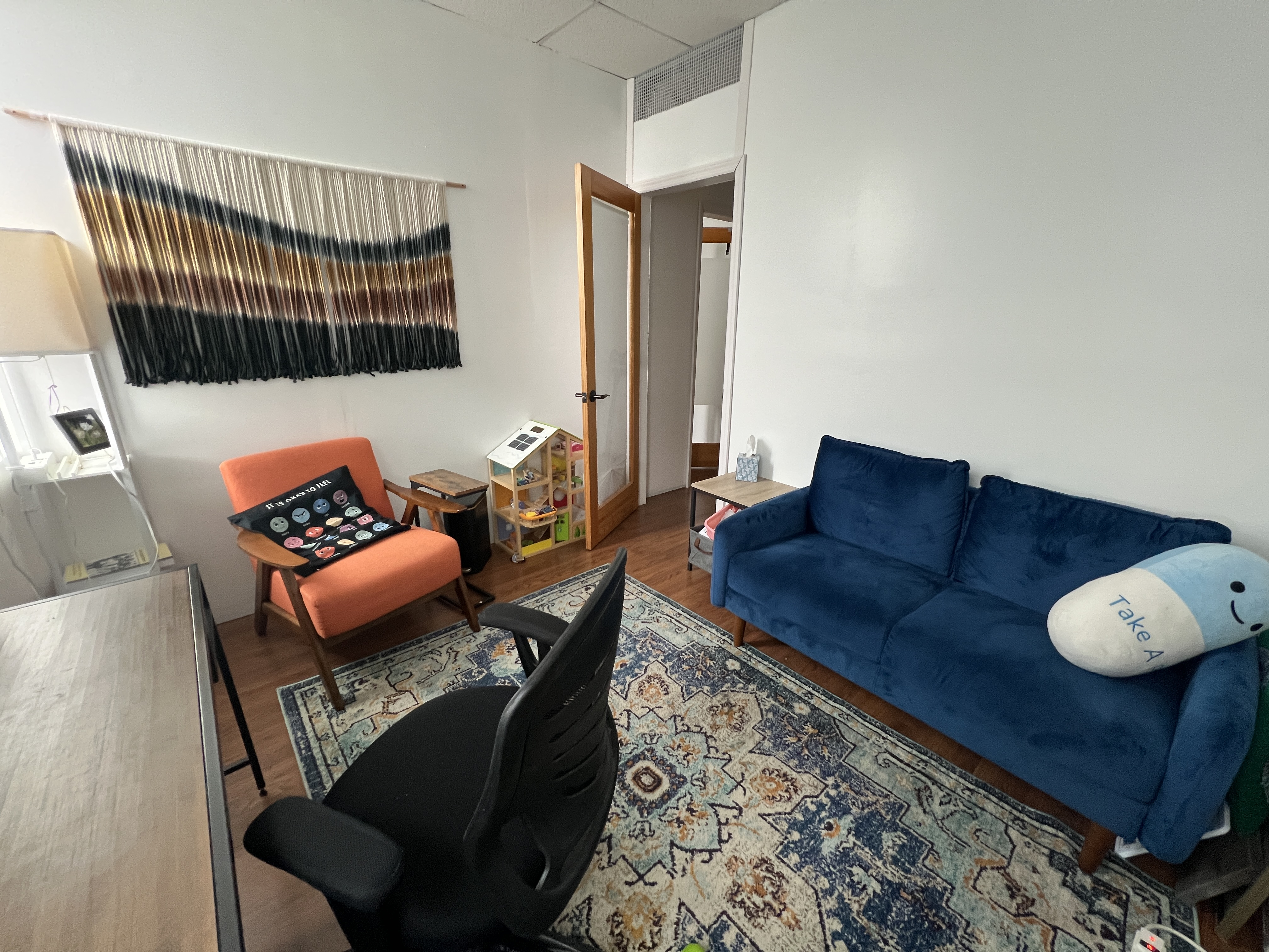 Inviting waiting area with seating and natural light