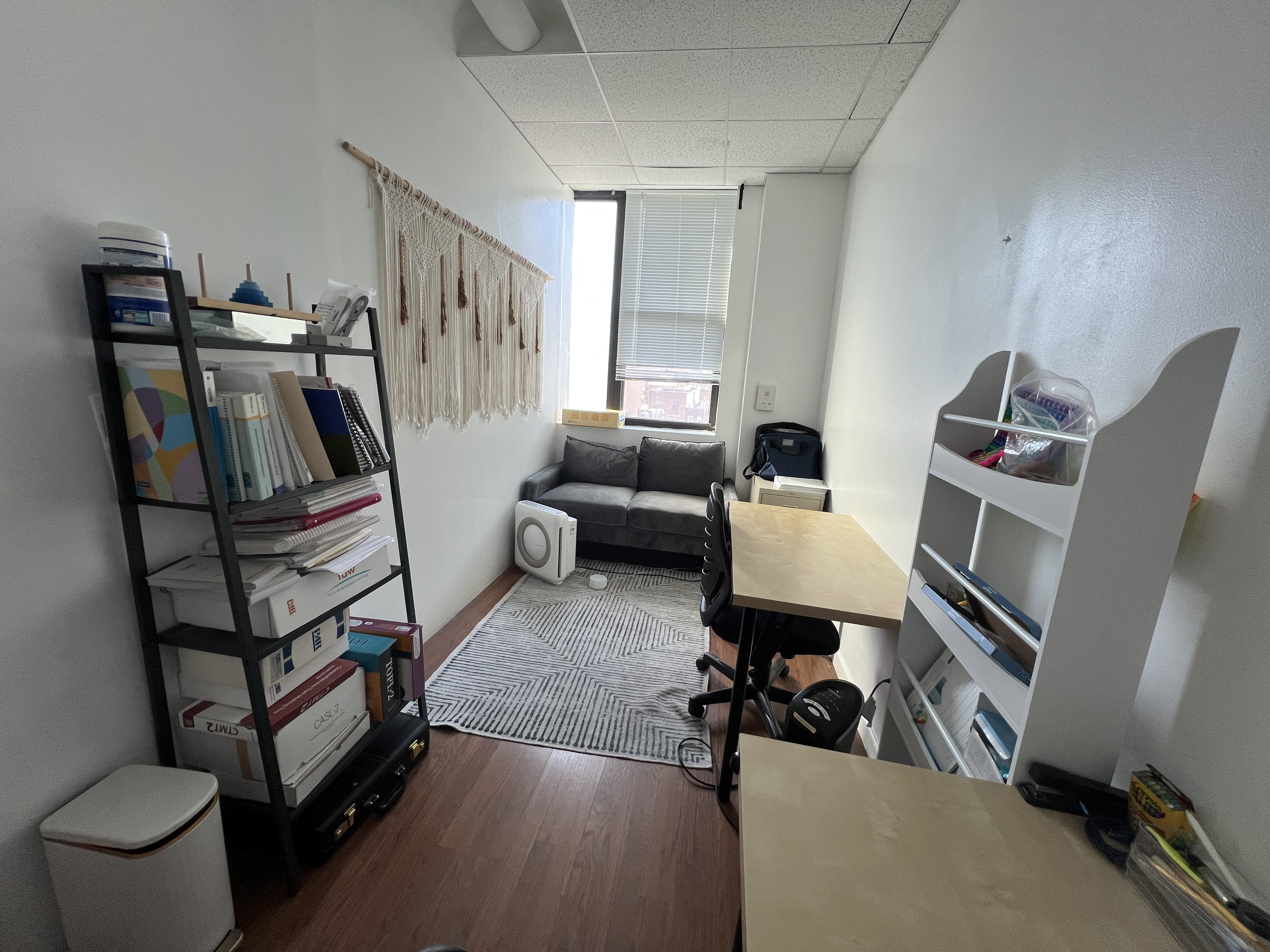 Welcoming reception area with seating and desk