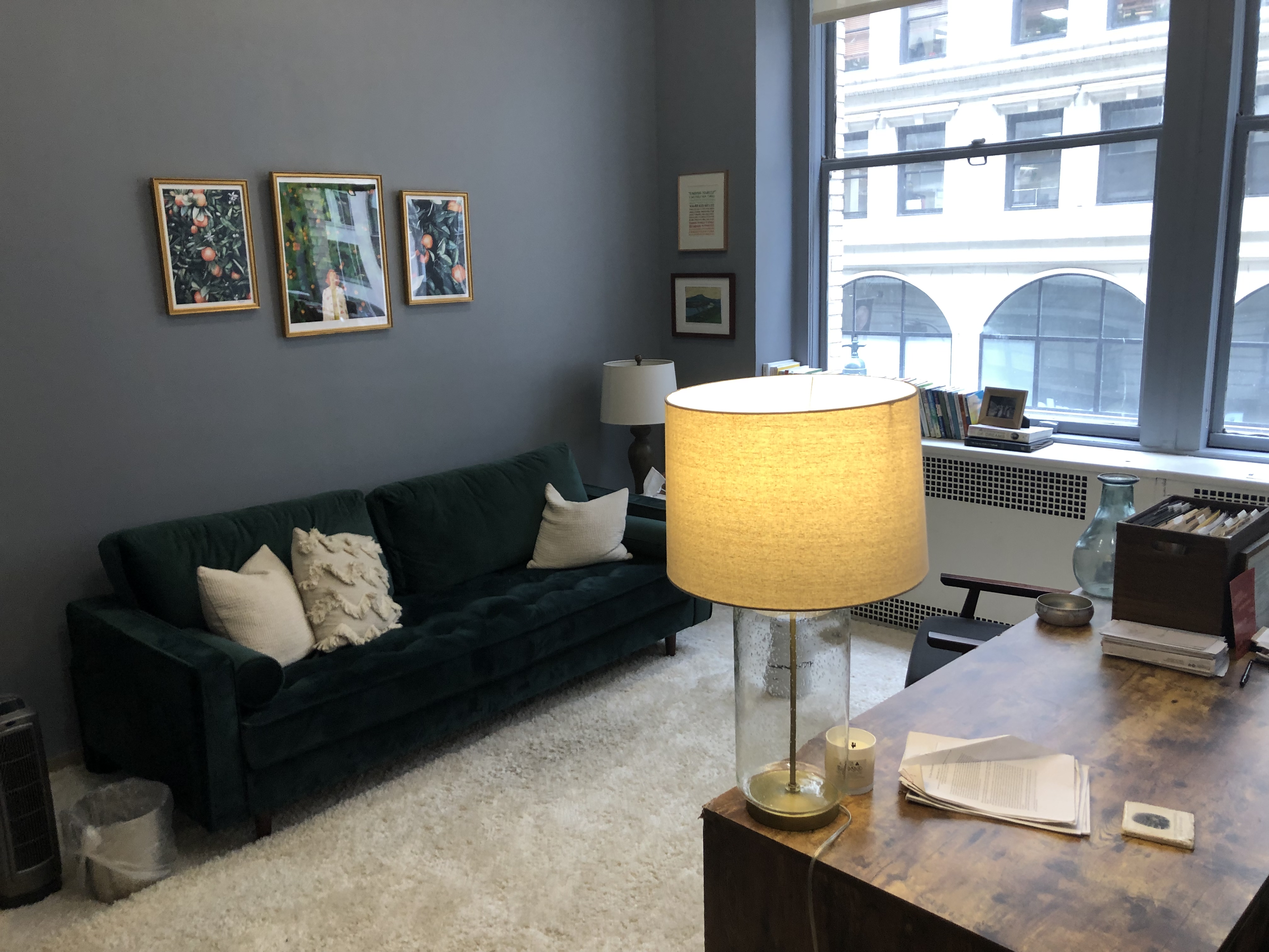 Comfortable living room area with couch and table lamps