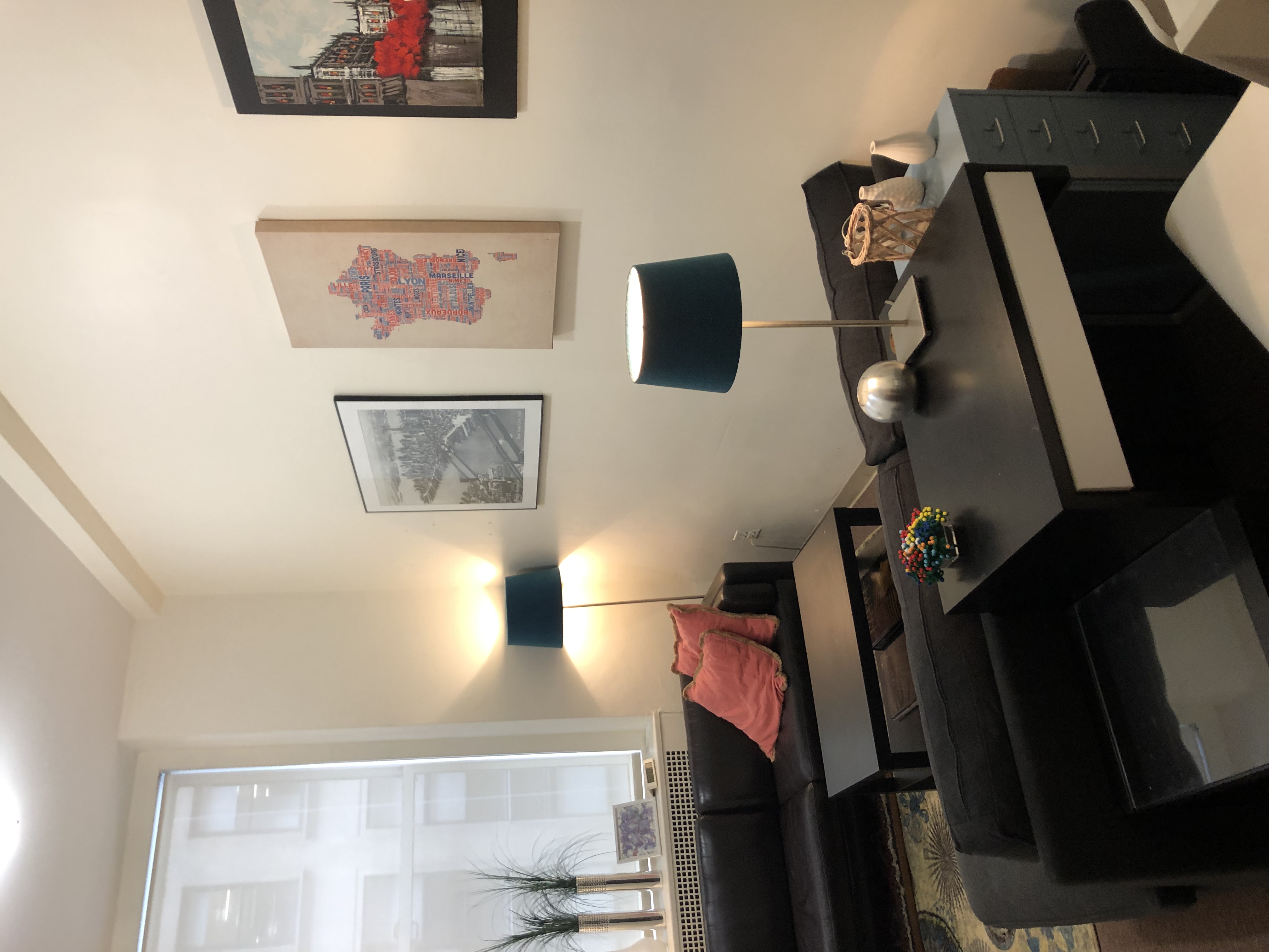 Living room style office with couch and coffee table