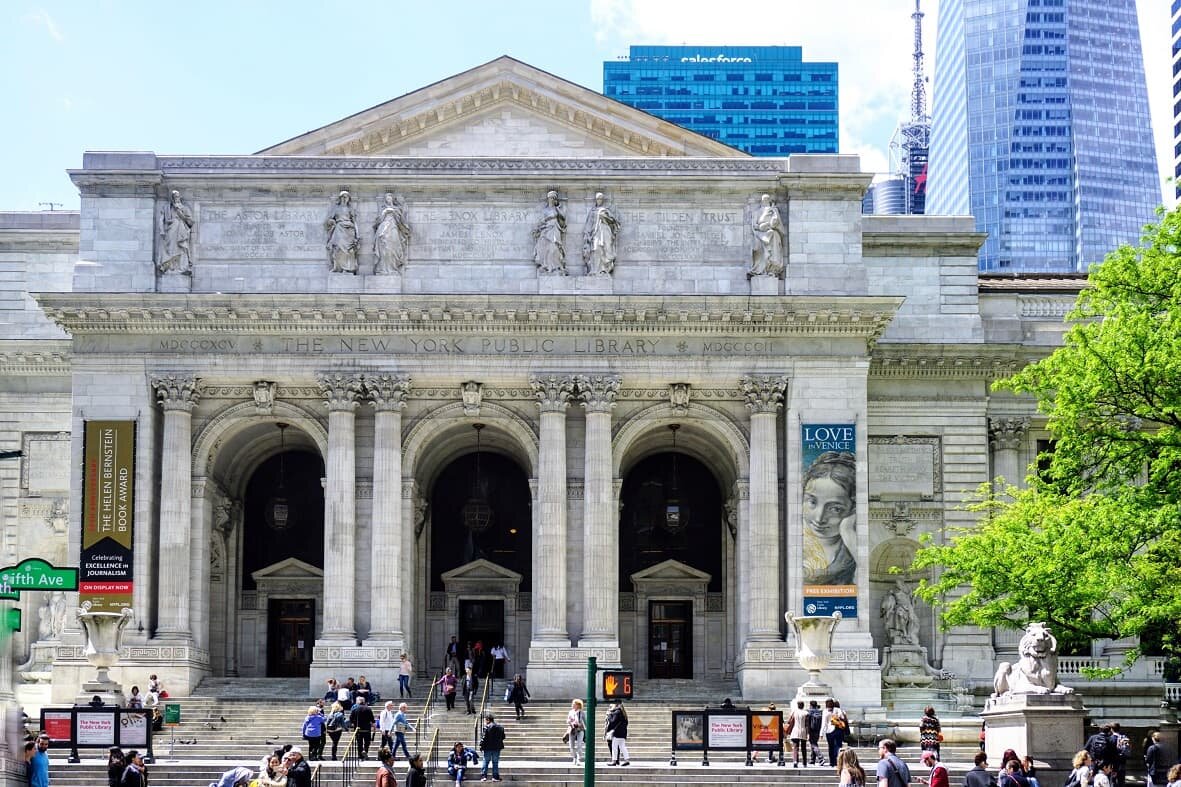 Urban office building with large arch and portico entrance