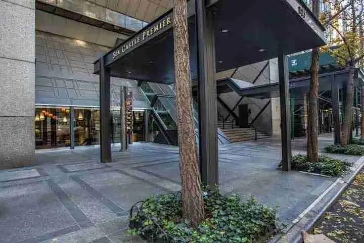 Urban shopping mall with multiple retail storefronts visible