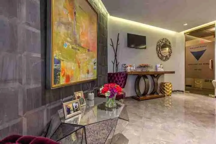 Spacious foyer with modern furniture and decor