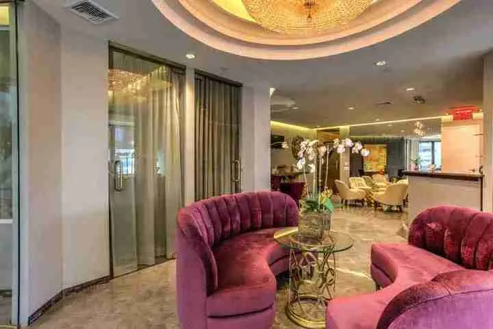 Modern office waiting area with seating and decor