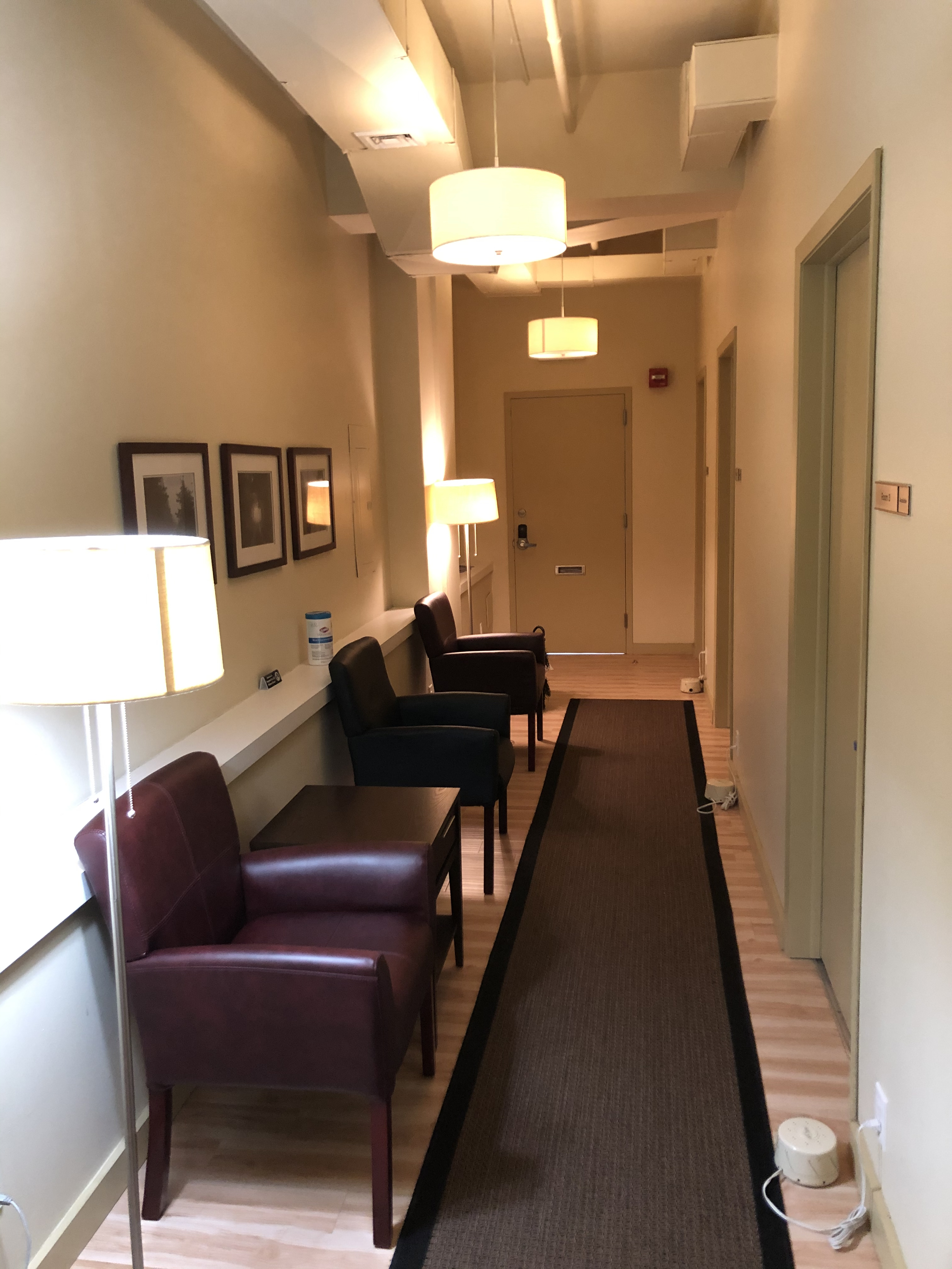 Comfortable living room setup with couch and chairs