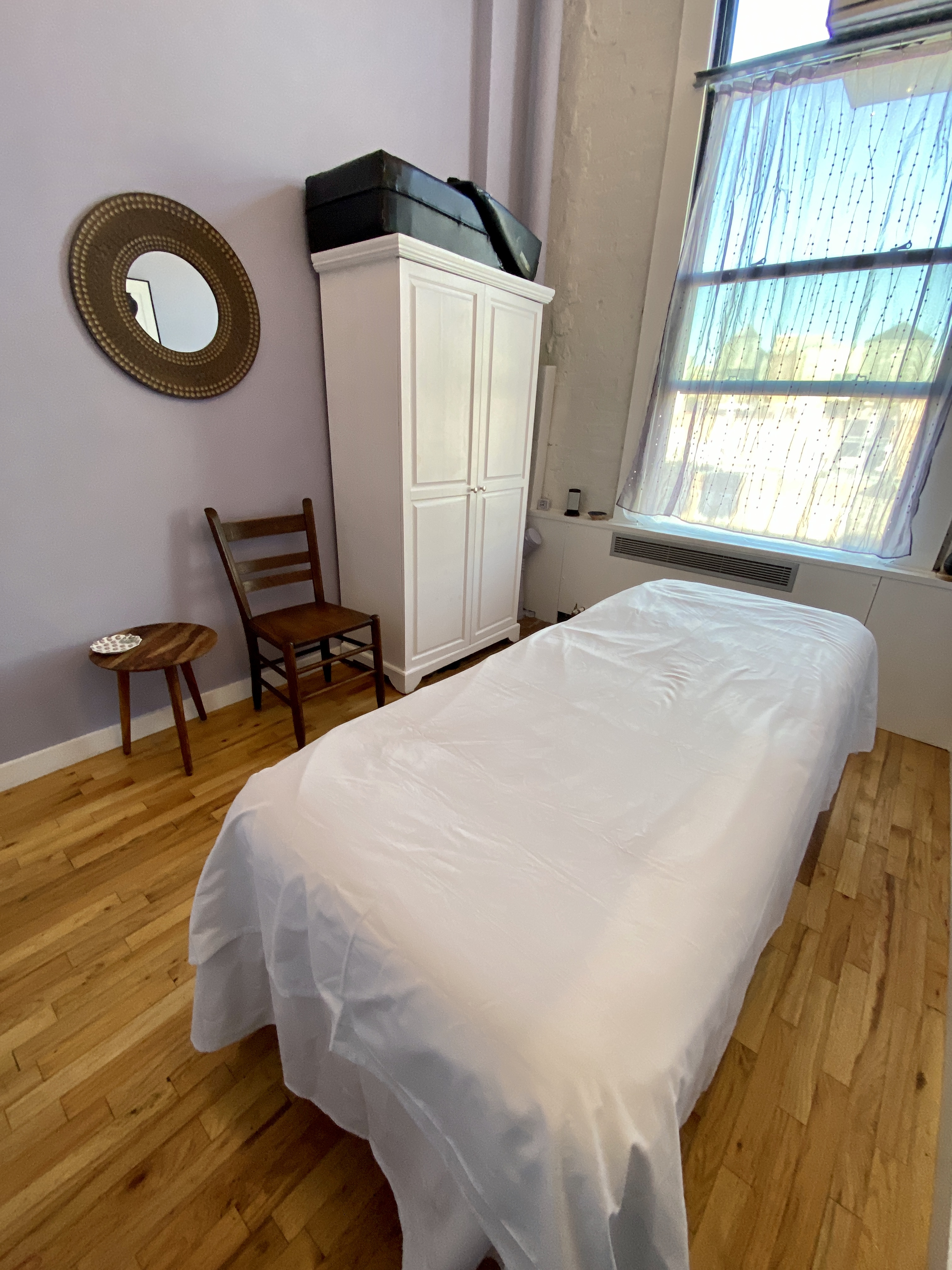 Interior view showing hardwood flooring and office furniture
