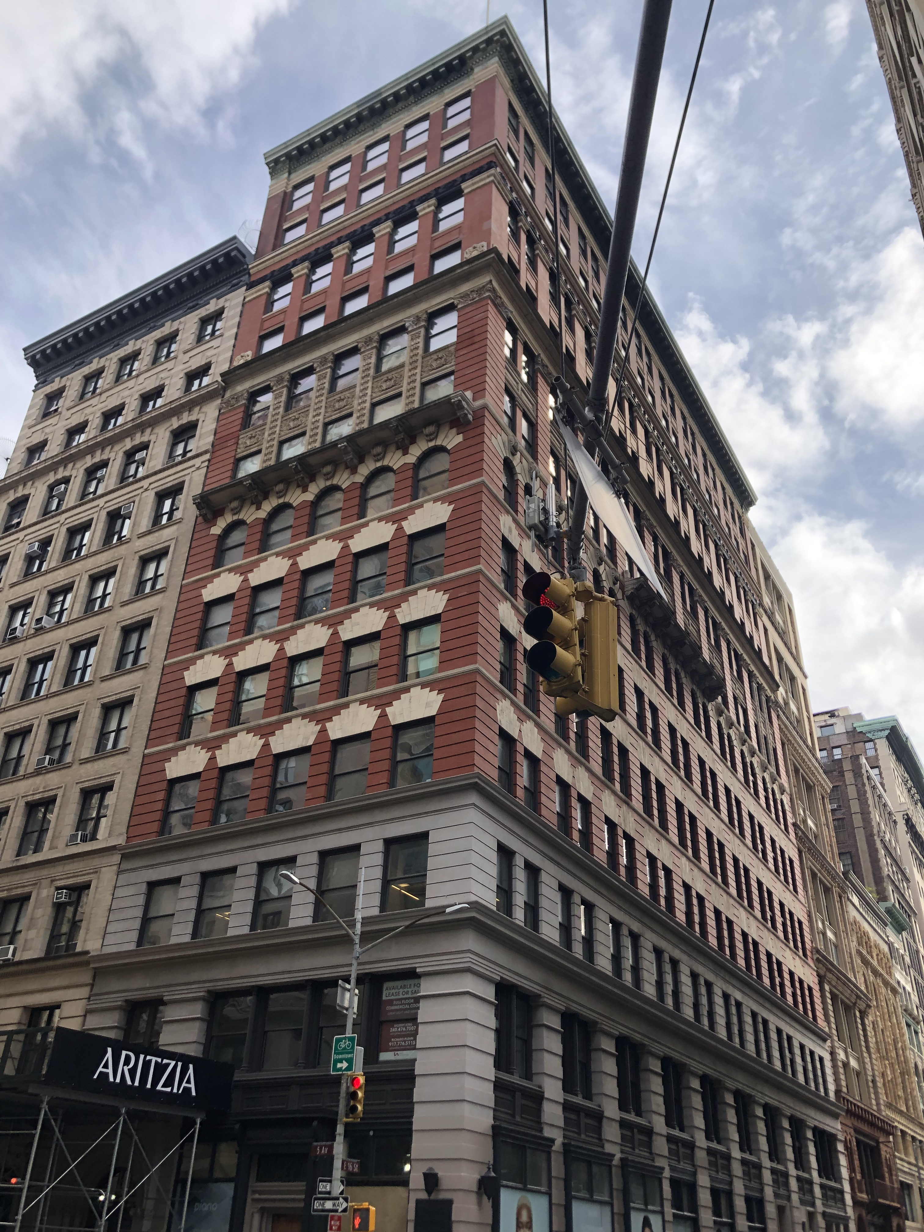 Office corridor with multiple doors leading to different rooms