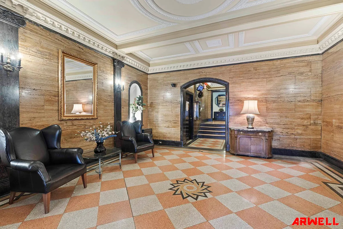 Welcoming reception room with chairs and decorative lamp