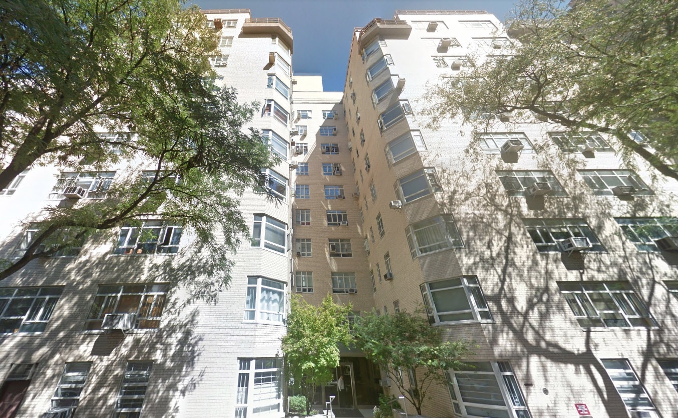 High-rise building in urban neighborhood with street access