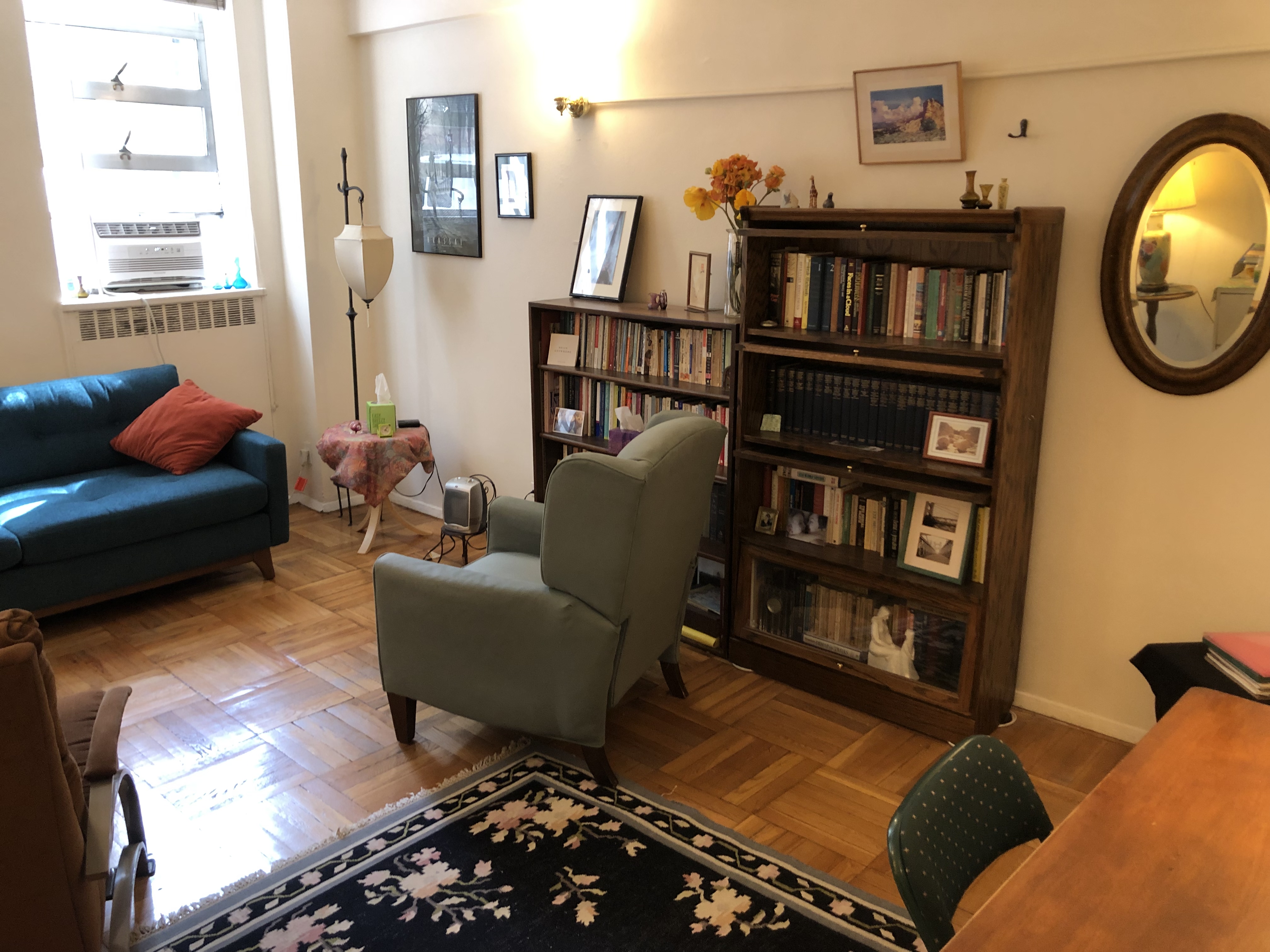 Office with couch, chairs, and desk furnishings