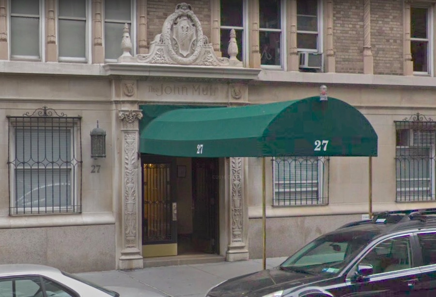 Office building with awning and canopy on city street