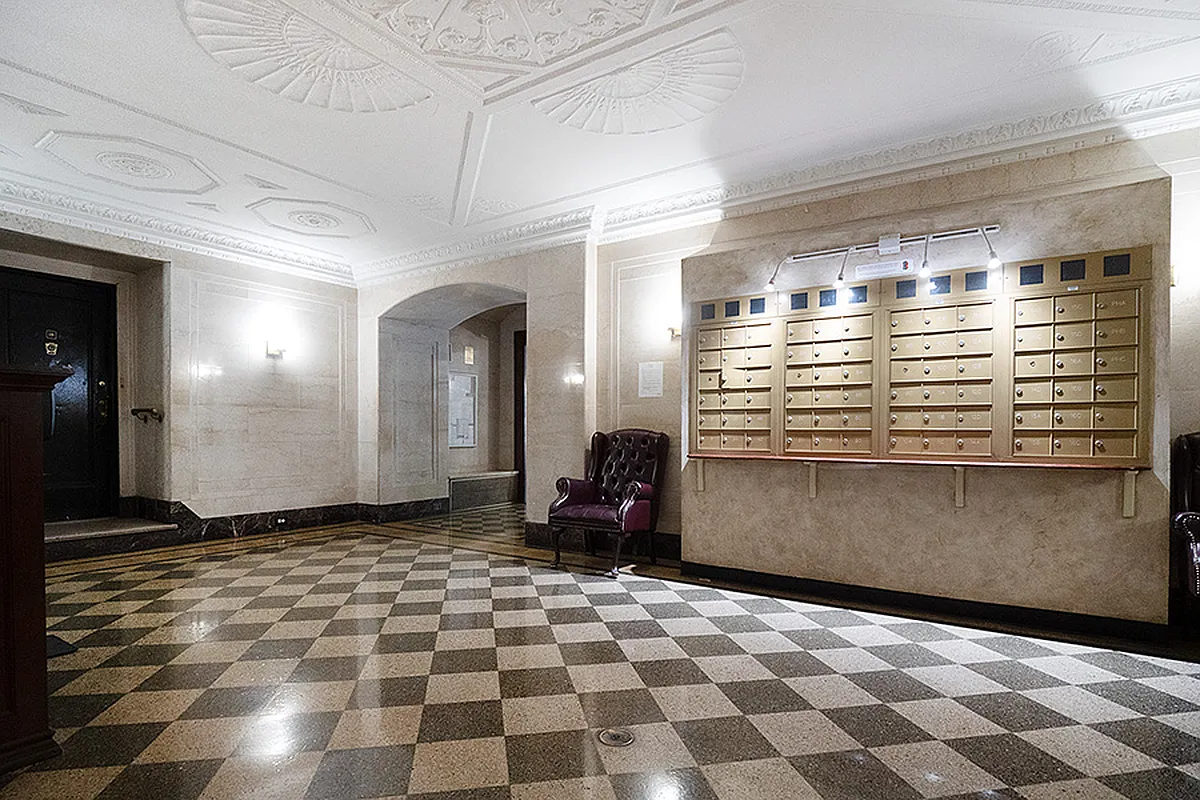 Stylish office hallway with doors leading to private offices