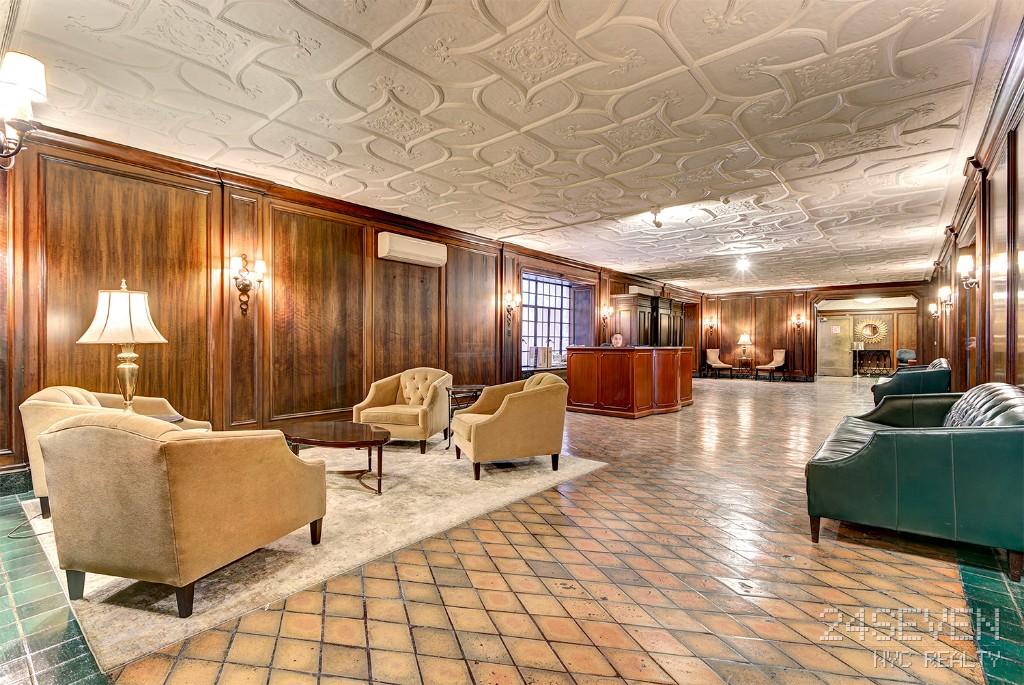 Foyer area with couches and modern interior design