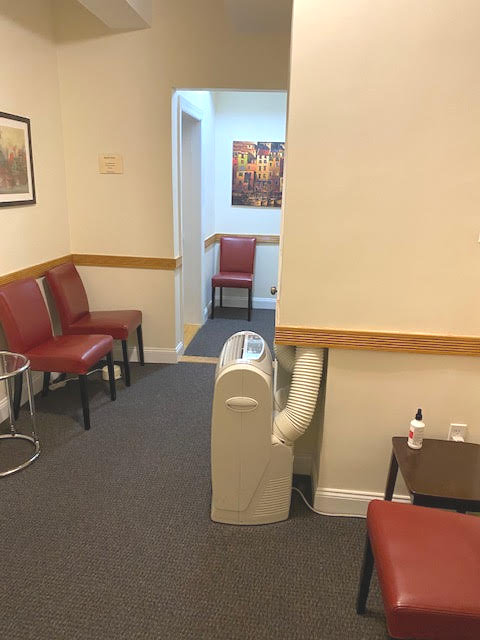 Waiting room with chairs and soft lighting