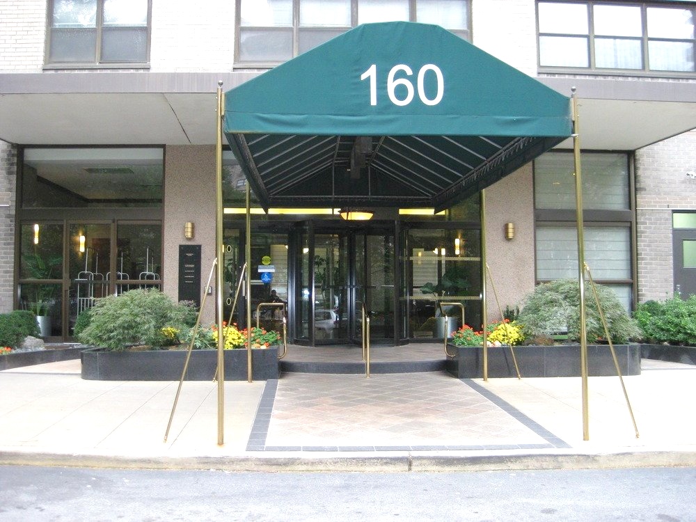 Urban office building with canopy and awning at entrance