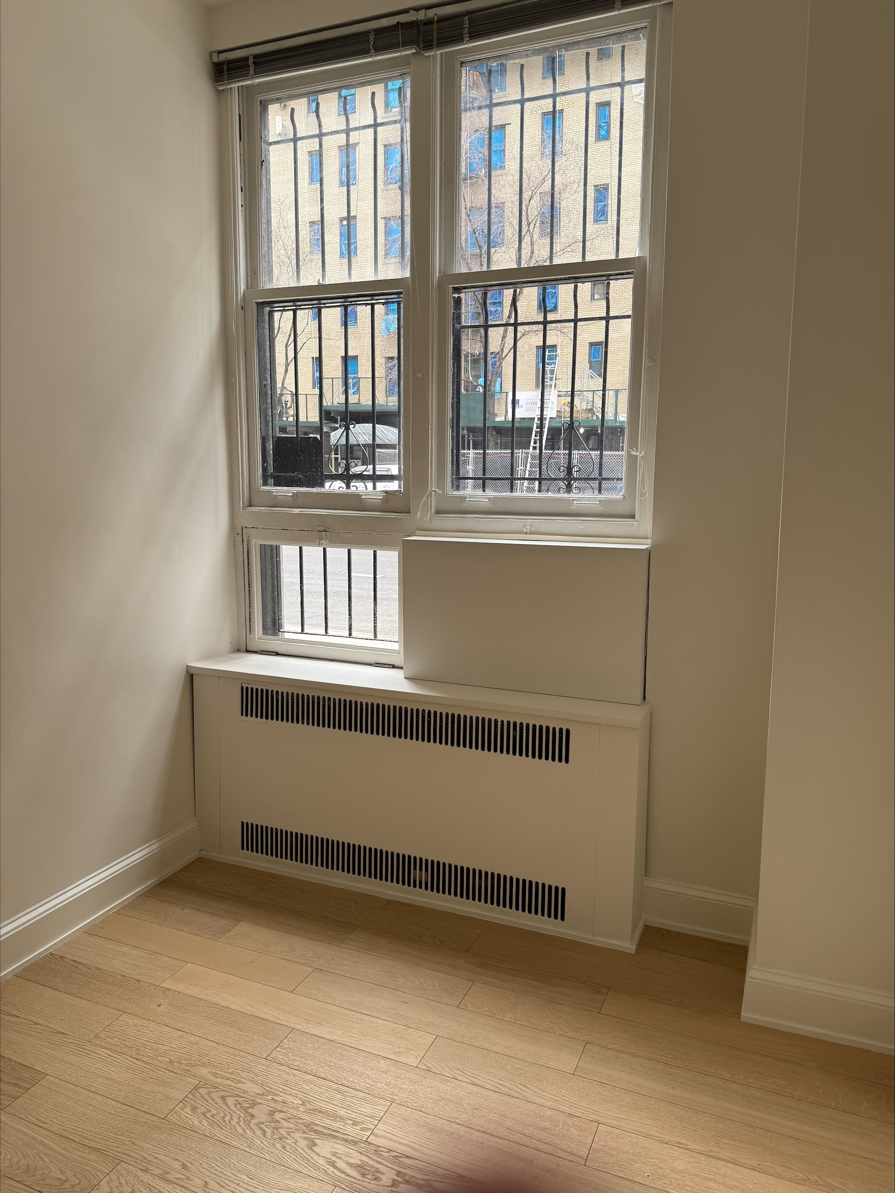 Bright office interior with large windows and polished floor